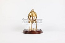 Brass compass dial on wooden plinth
