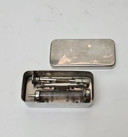 Syringe In Metal Case