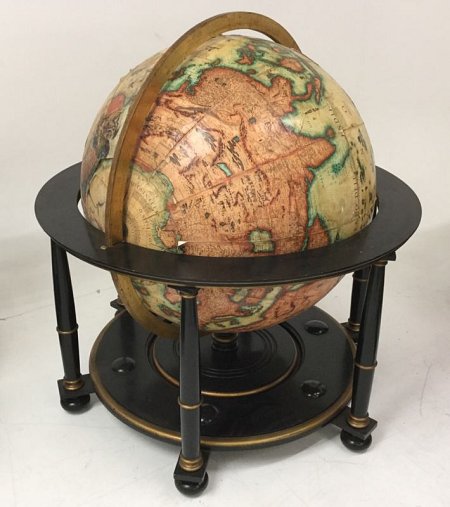 Very large globe on stand.