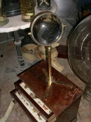 Large magnifier on brass stand